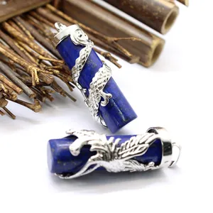 Close-up detail of ethnic style dragon and phoenix lapis lazuli stone pillar pendants