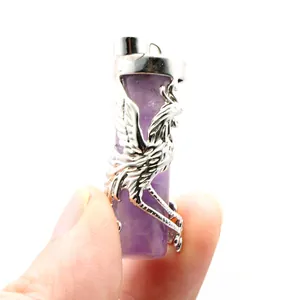 Close-up of purple crystal pillar pendant with intricate silver dragon metal wrap design