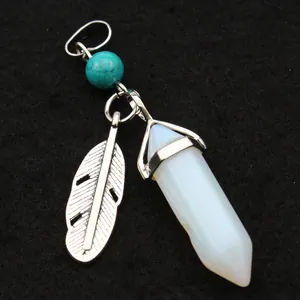 Detail showing hexagonal opalite crystal point with silver feather and turquoise bead