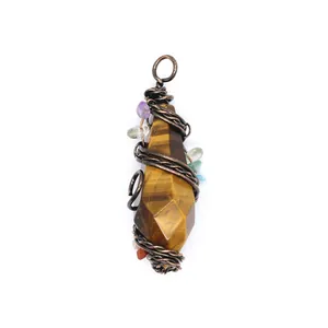 Close-up of vintage tiger's eye pendant featuring antique bronze wire wrap and colorful stone beads.