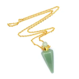 Detail view of a green crystal hexagonal cone pendant used as a refillable perfume bottle.