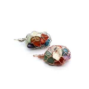 Detail view of colorful tumbled crystal stones in handmade wire-wrapped mesh pendants