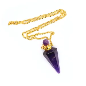 Detailed view of an amethyst hexagonal cone pendant perfume bottle with a gold chain.