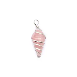 Macro view of a rose quartz hexagonal cone pendant with intricate silver wire wrap design