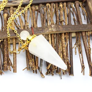 Close-up of white hexagonal crystal cone pendant perfume bottle necklace