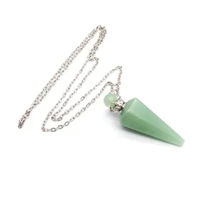 Detailed macro view of a green crystal hexagonal column conical pendant on a silver chain