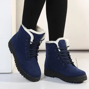 Elegante marineblaue Damen-Schneestiefel mit weißem Kunstfellfutter und Schnürung.