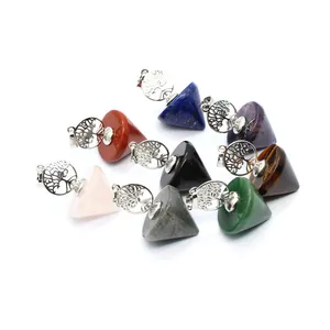 Collection of conical crystal stone pendants featuring silver-tone Tree of Life charms