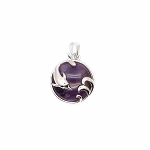 Detailed view of silver dolphin and wave design on a round purple amethyst pendant