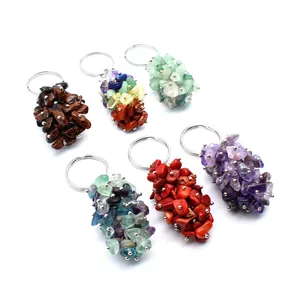 Variety of colorful natural crystal stone chip keychains and bag hanging ornaments.