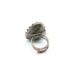 Rear view of antique bronze teardrop labradorite ring showing adjustable multi-strand band