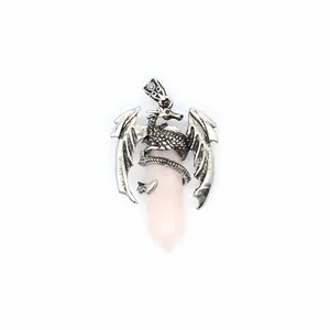 Antique silver dragon pendant detail wrapped around a rose quartz hexagonal pillar