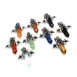 Detail view showing a variety of dragon wing hexagonal crystal pendants in different stones