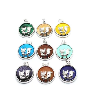 Detailed macro shot of various colored fox pendant necklaces with stone-style inserts