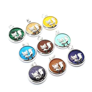 Close-up view of multiple natural stone fox pendants in vibrant colors for jewelry