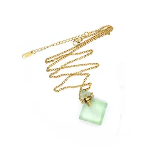 Detail view of rhombic fluorite perfume bottle pendant necklace with dropper