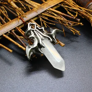 Detailed view of a gothic dragon wing pendant featuring a hexagonal white crystal pillar