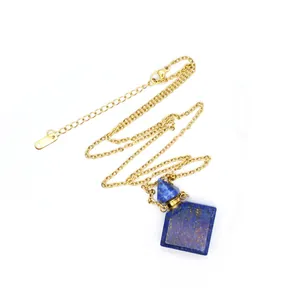 Close-up of lapis lazuli perfume bottle pendant necklace with steel chain and pipette