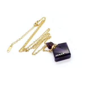 Detailed view of diamond-shaped purple fluorite perfume bottle pendant necklace with chain