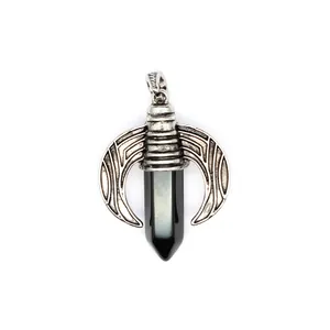 Detailed shot of gothic silver wing pendant with hexagonal black stone crystal for men