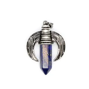 Close-up view of a hexagonal lapis lazuli crystal pendant featuring vintage silver dragon wings