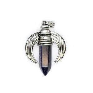 Close-up of a blue goldstone crystal point pendant with silver-toned wing-shaped metal casing.