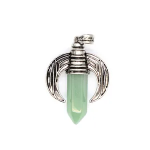 Detailed view of antique silver dragon wing pendant with light green hexagonal crystal point
