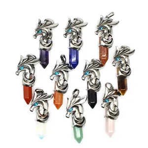 Detailed view of dragon head pendants with hexagonal natural stone pillars in assorted colors