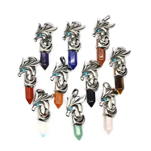 Detailed view of assorted dragon head hexagonal crystal pillar pendants in various colors