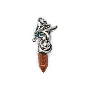 Detailed view of silver dragon pendant wrapping around brown goldstone hexagonal pillar