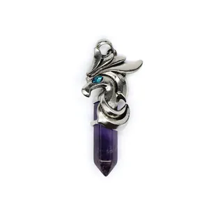 Detailed close-up of a silver dragon head pendant holding a purple hexagonal crystal point