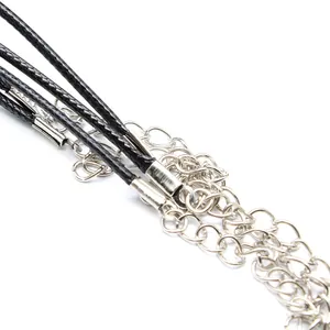 Macro detail of 2mm black wax cord with silver extension chain and lobster clasp