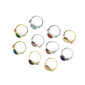 Variety of ins style adjustable hexagonal crystal rings in various gemstone colors.