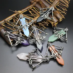 Detailed view of Cupid's arrow pendants with various colorful hexagonal crystals