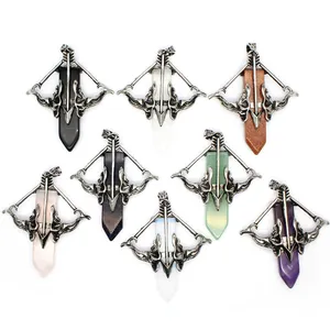 Detailed showcase of multiple Cupid's bow and arrow crystal point pendants collection