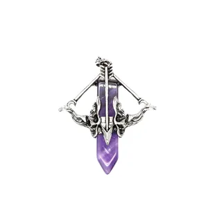 Detailed macro view of Cupid's bow pendant with purple hexagonal crystal point.