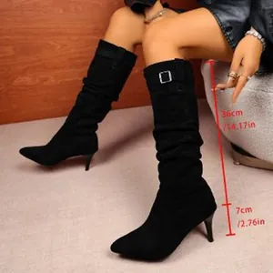 Detail view of black pointed toe slouchy boots with 7cm thin high heel measurements