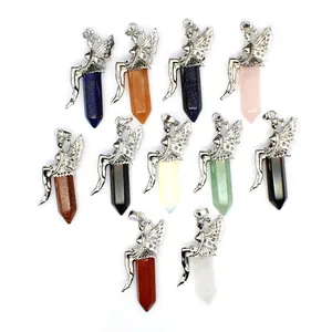 Detailed view of assorted natural stone hexagonal pendants with silver fairy accents