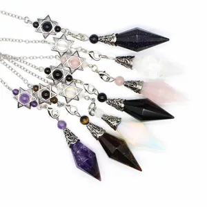Detailed macro view showing variety of natural stone faceted hexagram pendulums with silver chains