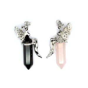 Macro view of rose quartz and obsidian fairy pendants with silver-tone wing details.