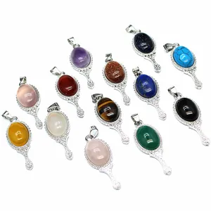 Selection of colorful natural stone pendants with vintage magic mirror design detail