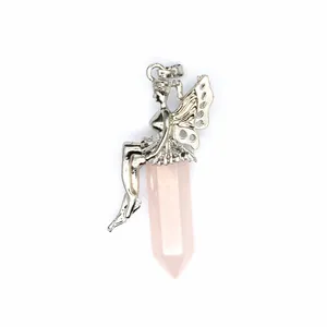 Detailed shot of a silver fairy figurine perched on a rose quartz hexagonal column pendant