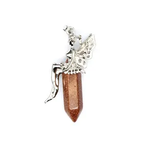 Detailed view of fairy pendant with brown sparkly hexagonal goldstone pillar.