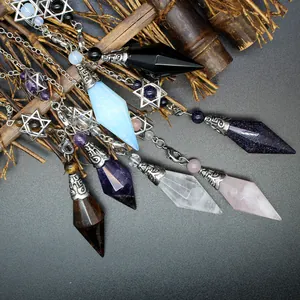 Macro view of assorted natural stone hexagonal cone pendulums with hexagram charms