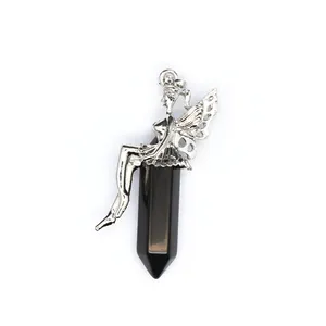 Close-up detail of silver fairy sitting on black hexagonal natural stone crystal point pendant