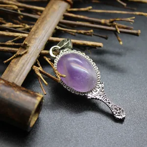 Vintage magic mirror pendant with purple natural stone and floral silver frame