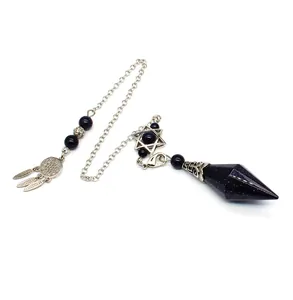 Close-up detail of blue goldstone faceted pendulum with dreamcatcher and star of david charms