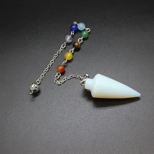 Detailed view of opalite crystal chakra pendulum with 7 chakra beads on silver chain link