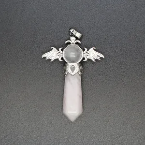 Detailed view of natural stone hexagonal crystal pendant with winged silver metal cap