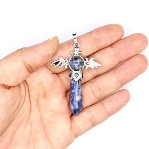 Natural blue sodalite crystal pendant with hexagonal pillar and silver bat wings jewelry detail